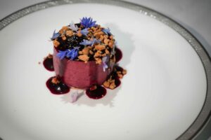 Blackberry Mousse with Lemon Thyme, Caramelised Chocolate Crumble by Monica Galetti © Singapore Airlines